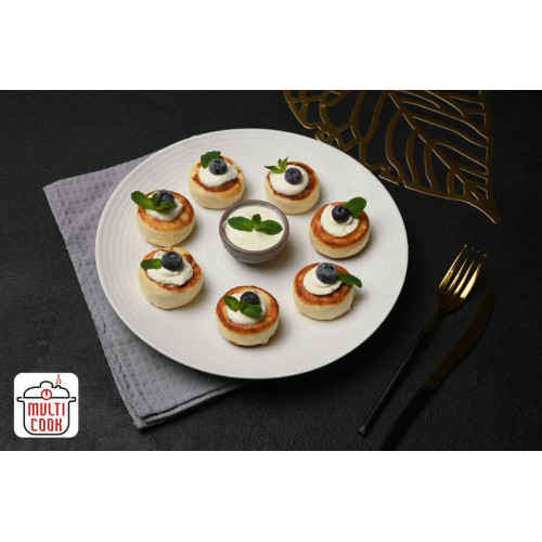 Syrnyky (cheese pancakes) –